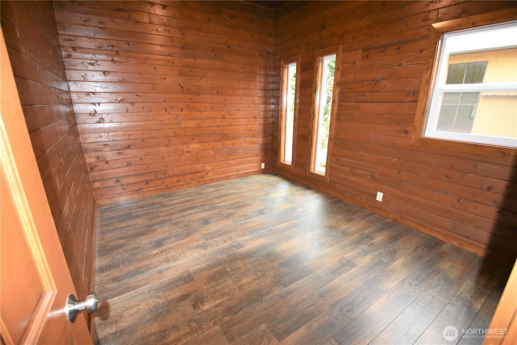 30331 Heimer Road Arlington, WA 98223 - Photo 6 of 37 a view of an empty room and wooden floor