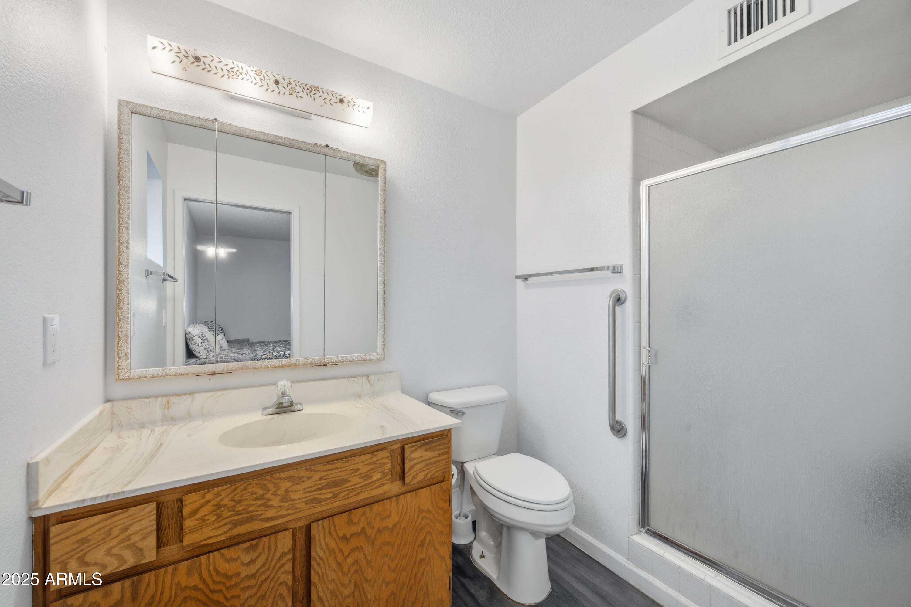 443 South Reseda Mesa, AZ 85206 - Photo 15 of 26 a bathroom with a sink toilet and shower