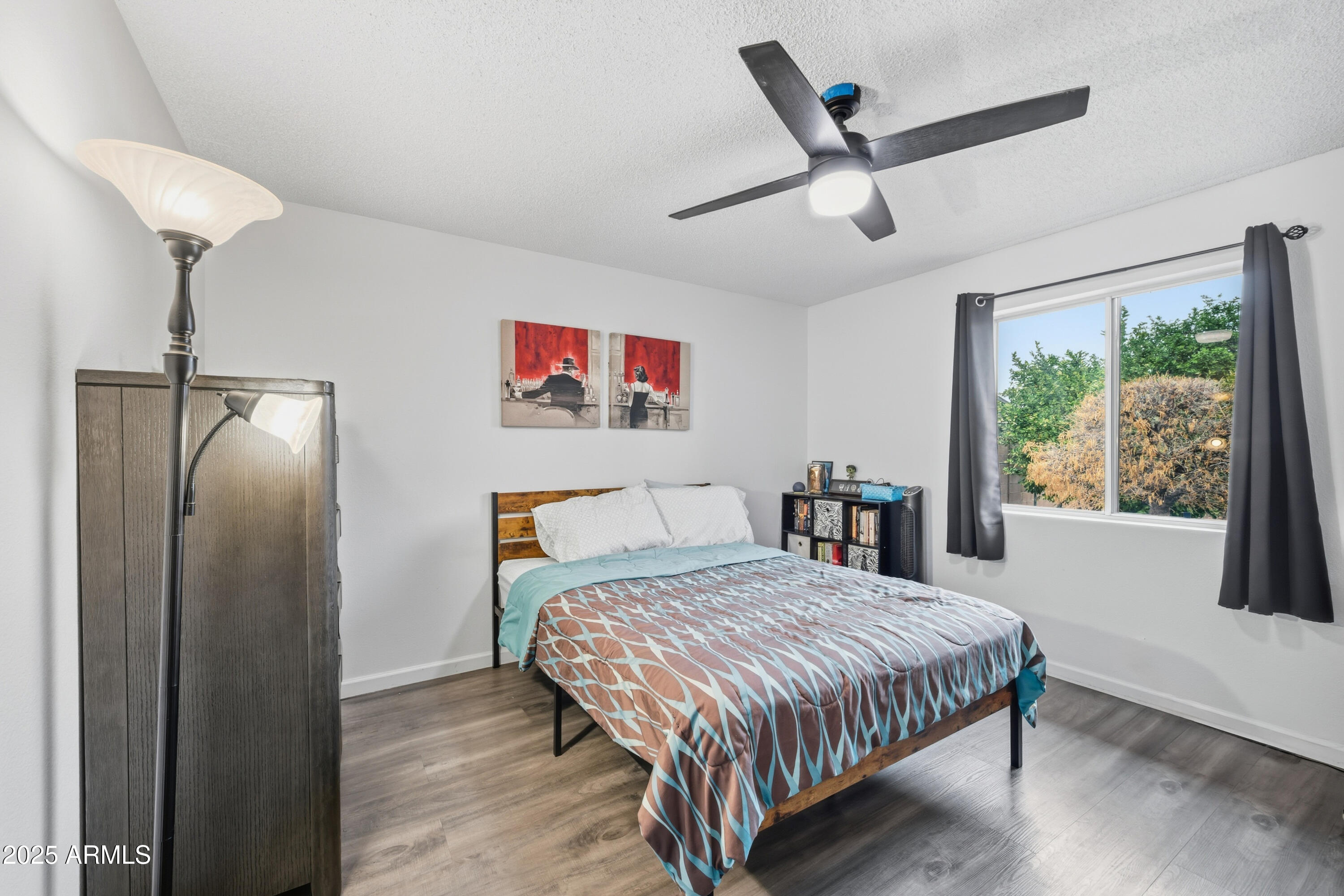 443 South Reseda Mesa, AZ 85206 - Photo 16 of 26 a bedroom with a bed and a refrigerator