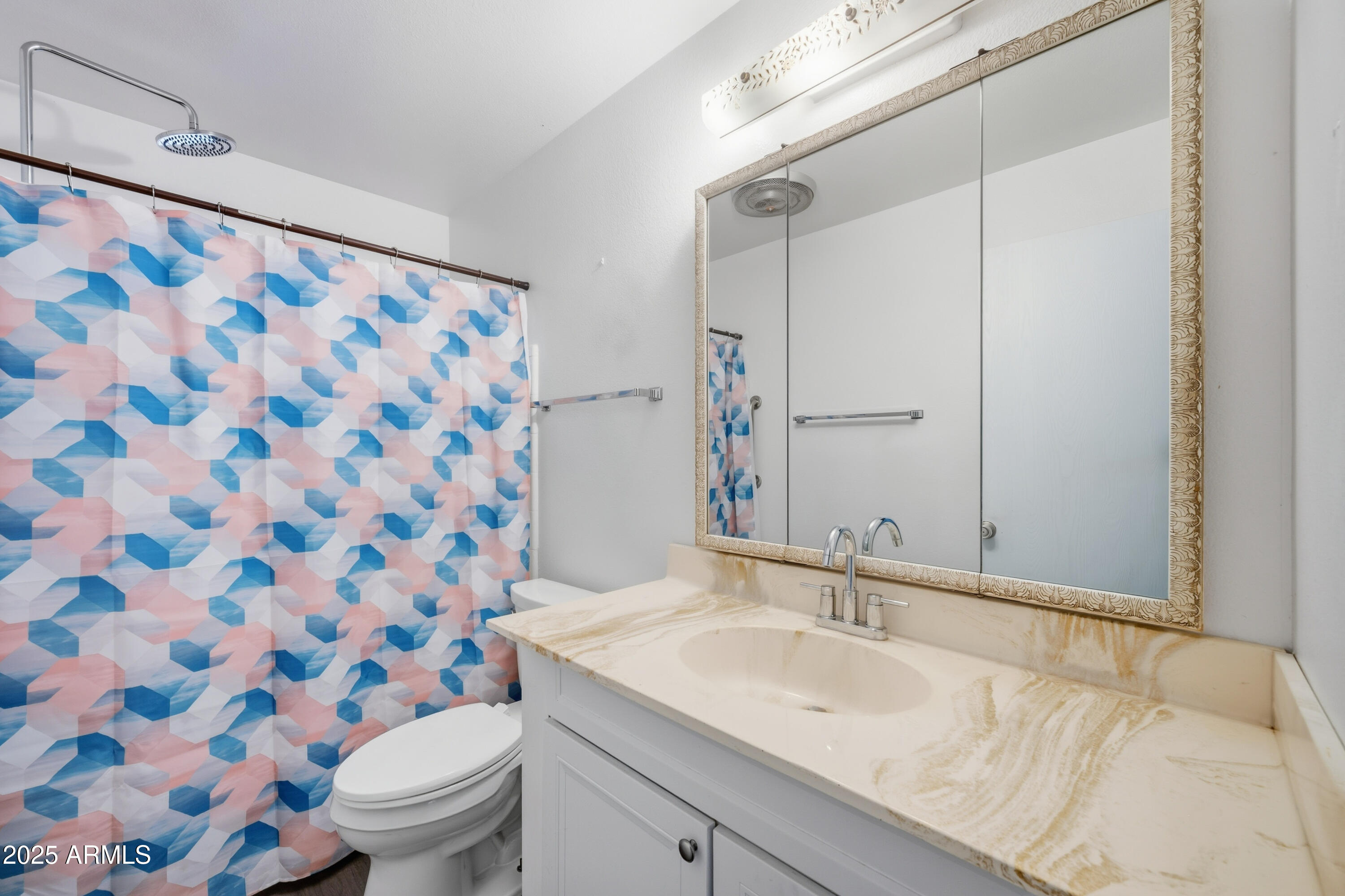 443 South Reseda Mesa, AZ 85206 - Photo 18 of 26 a bathroom with a sink and a mirror