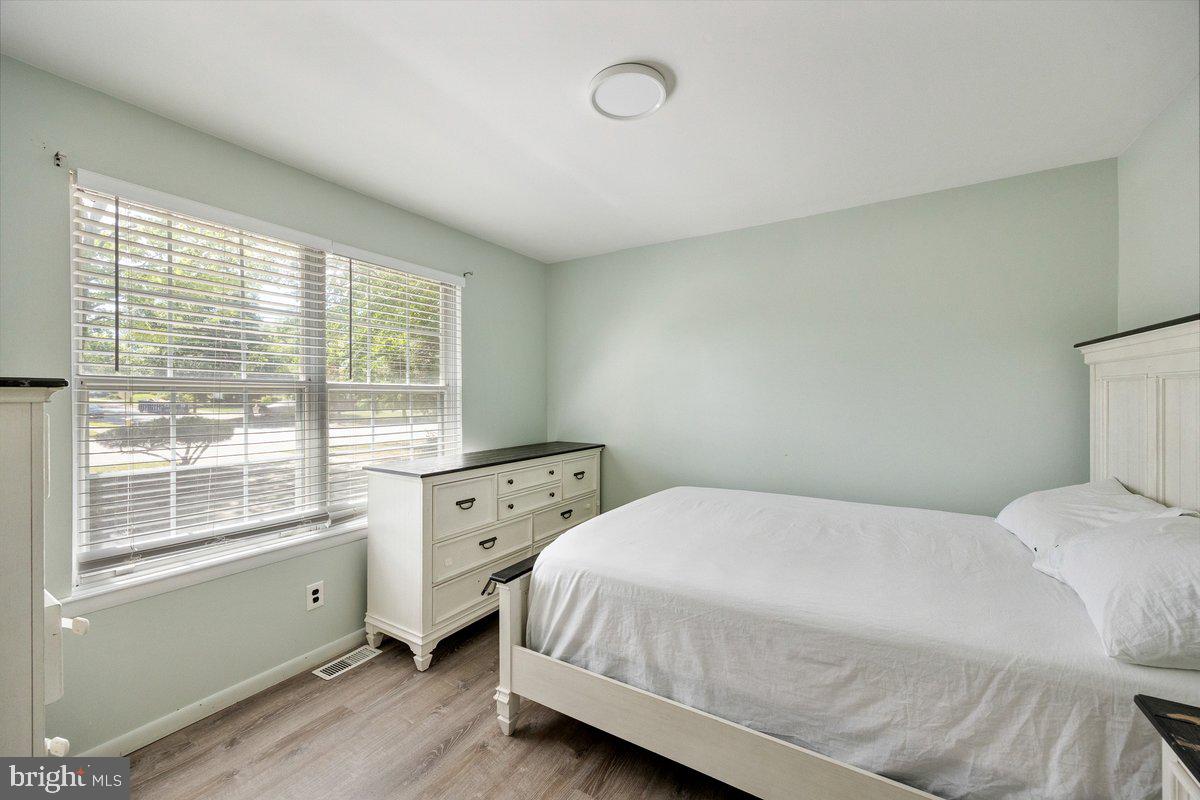 8275 Maple Avenue Pennsauken, NJ 08109 - Photo 11 of 43 a bedroom with a bed and a window
