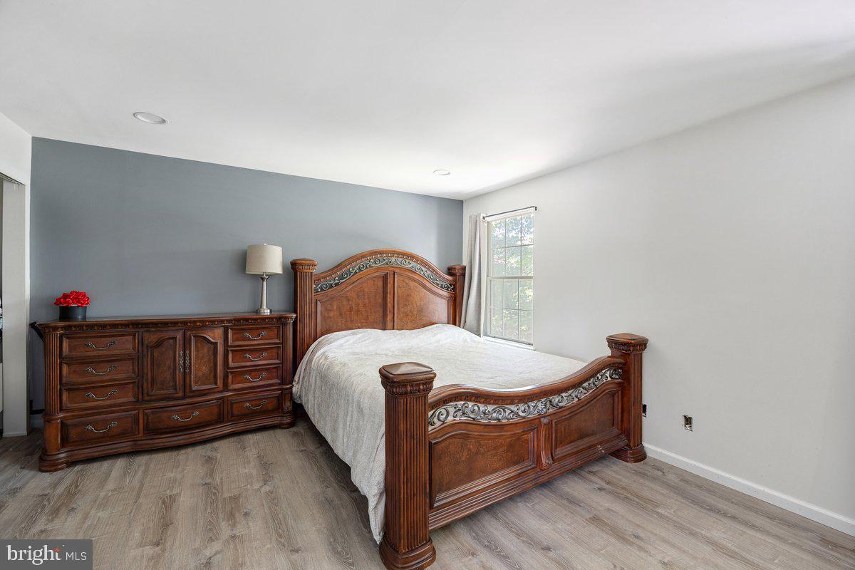 8275 Maple Avenue Pennsauken, NJ 08109 - Photo 12 of 43 a bedroom with a bed and dresser