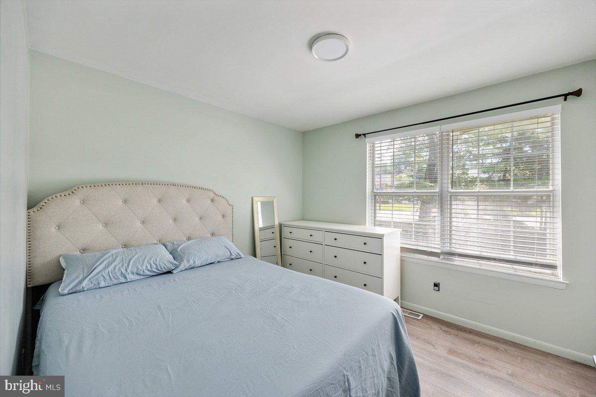 8275 Maple Avenue Pennsauken, NJ 08109 - Photo 14 of 43 a bedroom with a bed and window