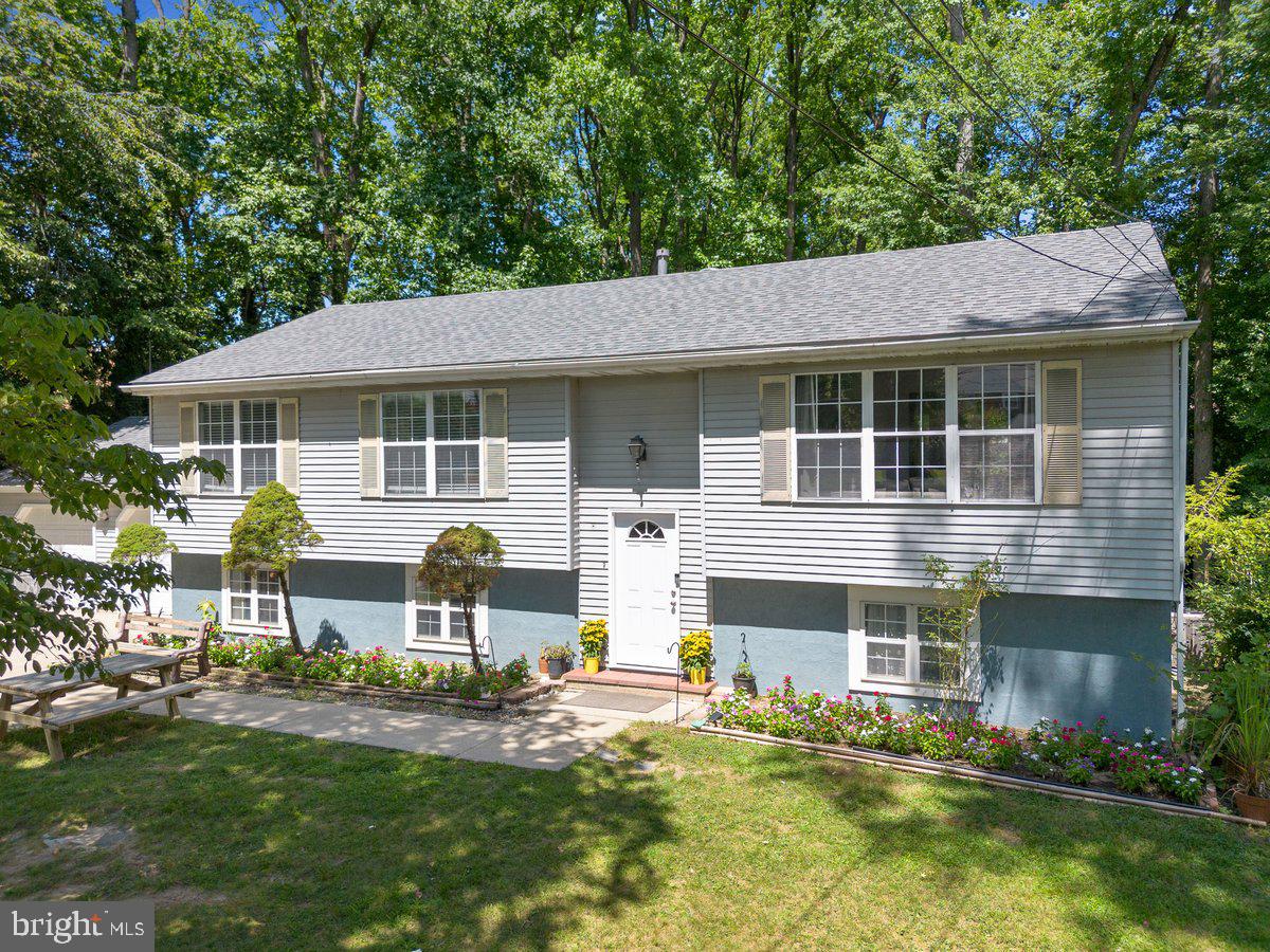 8275 Maple Avenue Pennsauken, NJ 08109 - Photo 25 of 43 a front view of a house with a yard