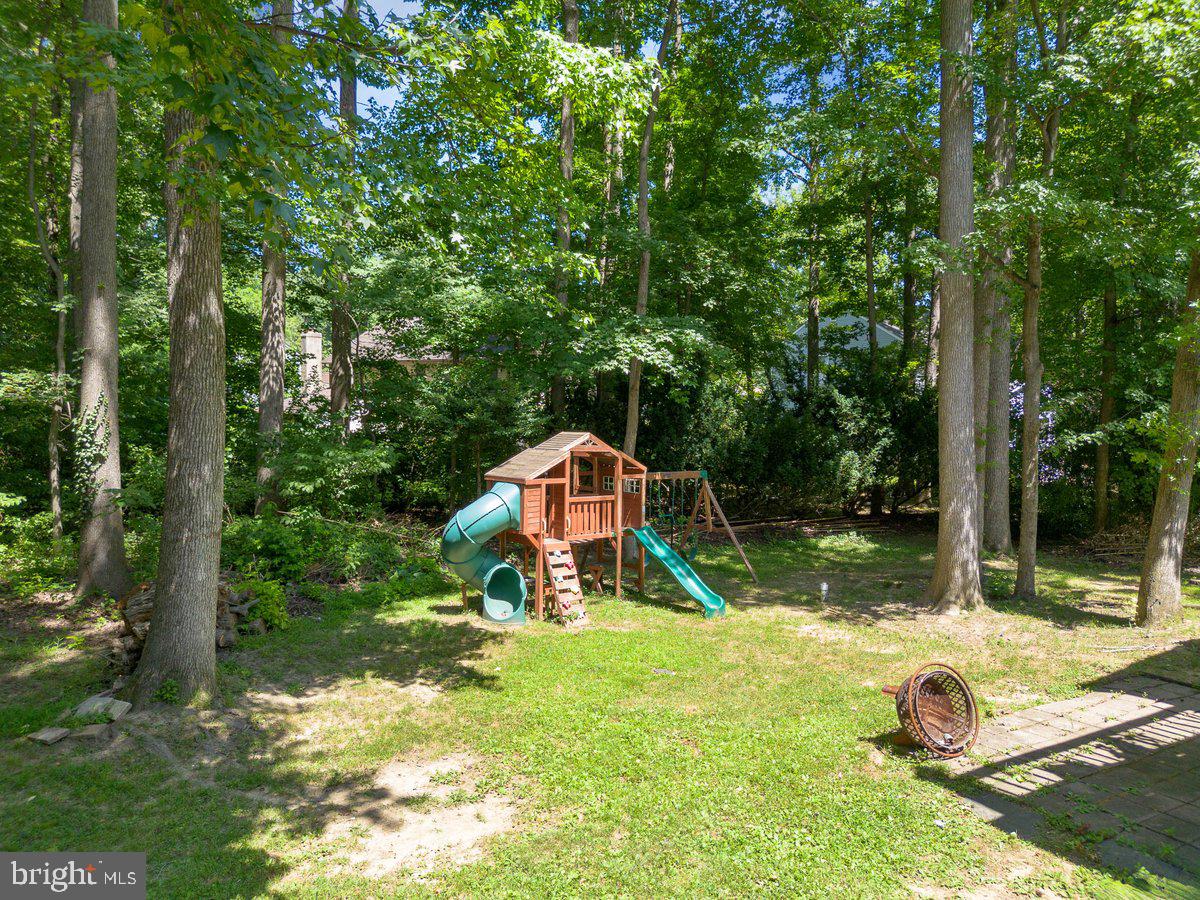 8275 Maple Avenue Pennsauken, NJ 08109 - Photo 38 of 43 a view of a garden with a slide