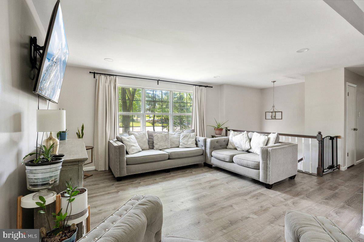 8275 Maple Avenue Pennsauken, NJ 08109 - Photo 4 of 43 a living room with furniture and a large window