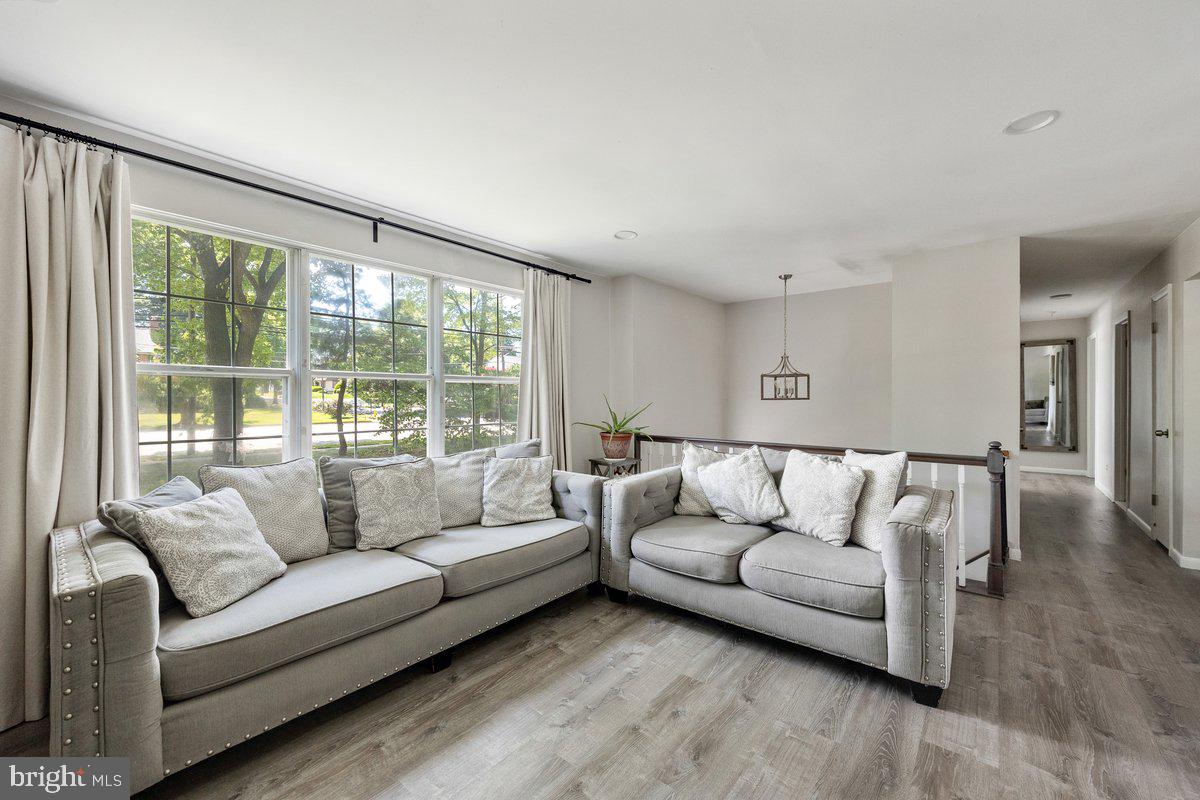 8275 Maple Avenue Pennsauken, NJ 08109 - Photo 5 of 43 a living room with furniture and a large window