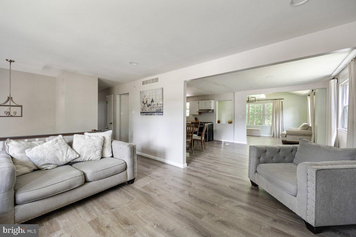 8275 Maple Avenue Pennsauken, NJ 08109 - Photo 6 of 43 a living room with furniture and a couch
