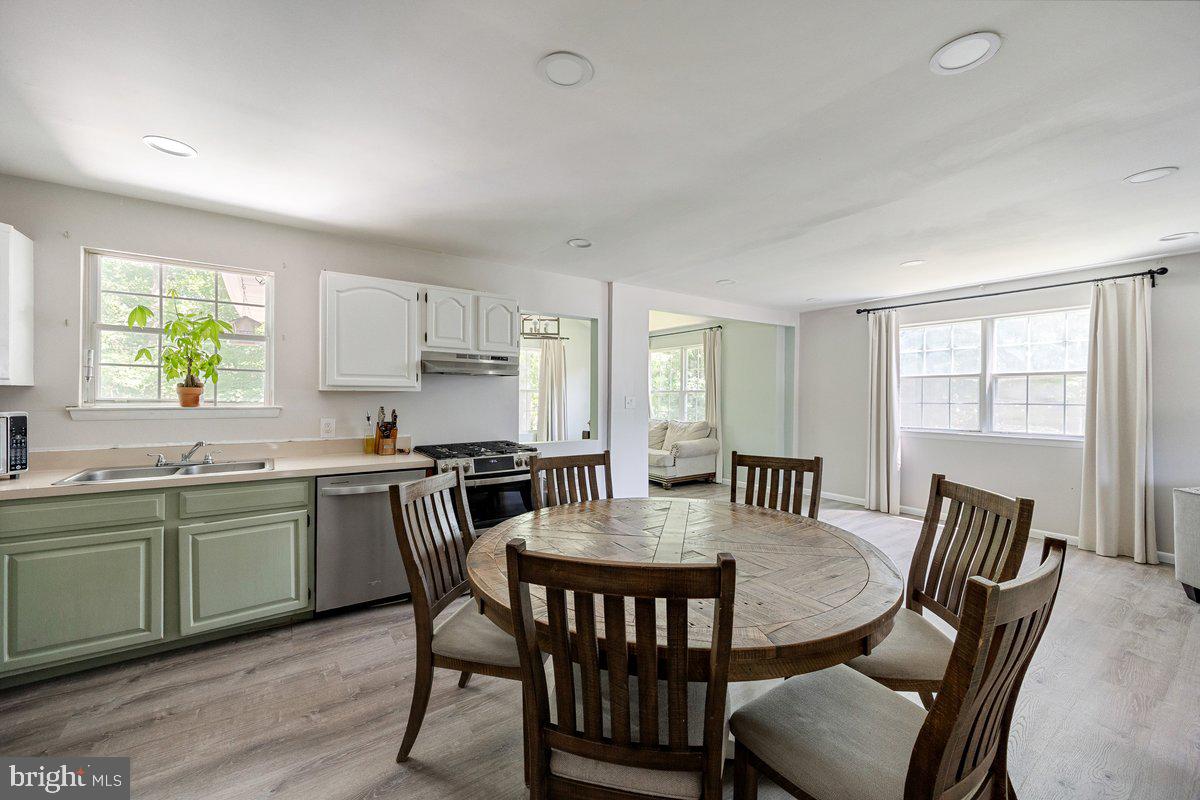 8275 Maple Avenue Pennsauken, NJ 08109 - Photo 7 of 43 a view of a dining room with furniture and window