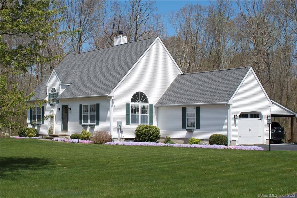 Gorgeous roomy cape on almost 1.5 acres in quiet neighborhood minutes to shoreline