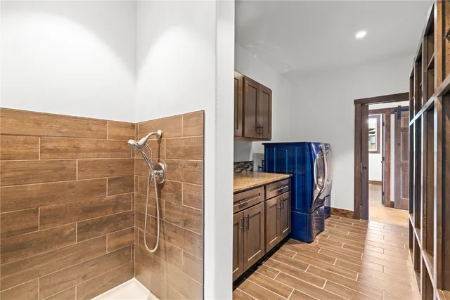 a view of a kitchen with a large window