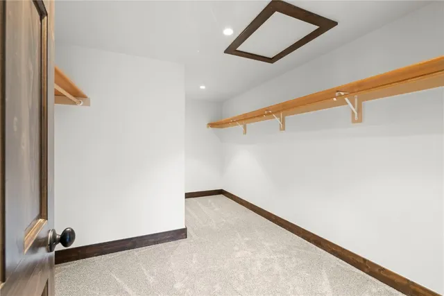 a bathroom with a tub and shower