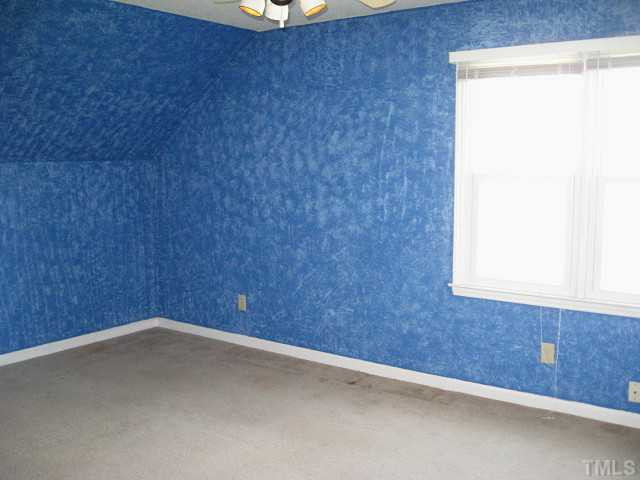 9500 Applewhite Road Wendell, NC 27591 - Photo 8 of 12 Second bedroom with ceiling fan