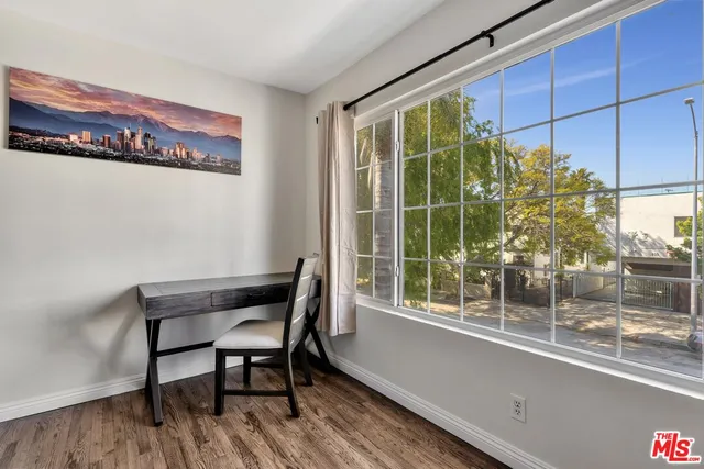 a view of a chairs and table in a room