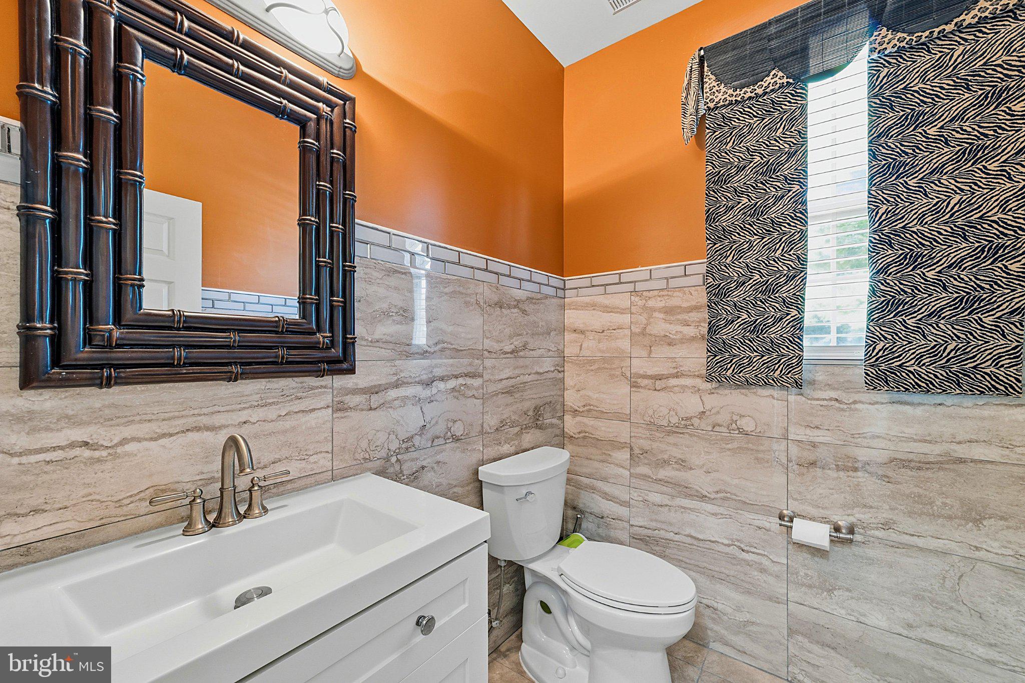 537 Riggs Avenue Berlin, NJ 08009 - Photo 15 of 32 Chic bathroom with vibrant accents.