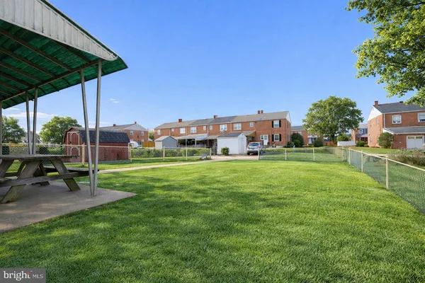 a view of a house with a big yard