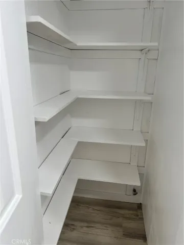 a view of an empty walk in closet