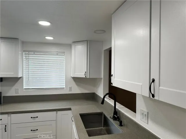 a room with a table and chairs