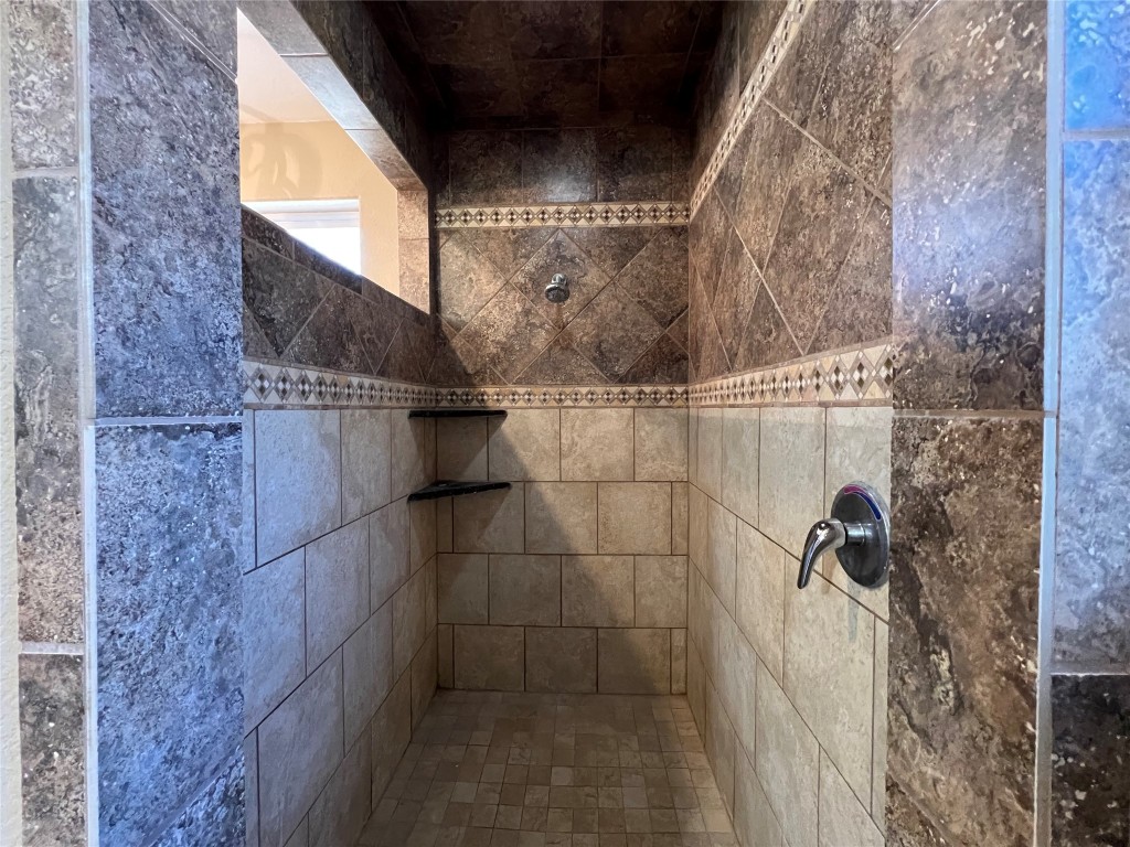665 Wilson Road Red Rock, TX 78662 - Photo 22 of 34 Bathroom with tiled shower