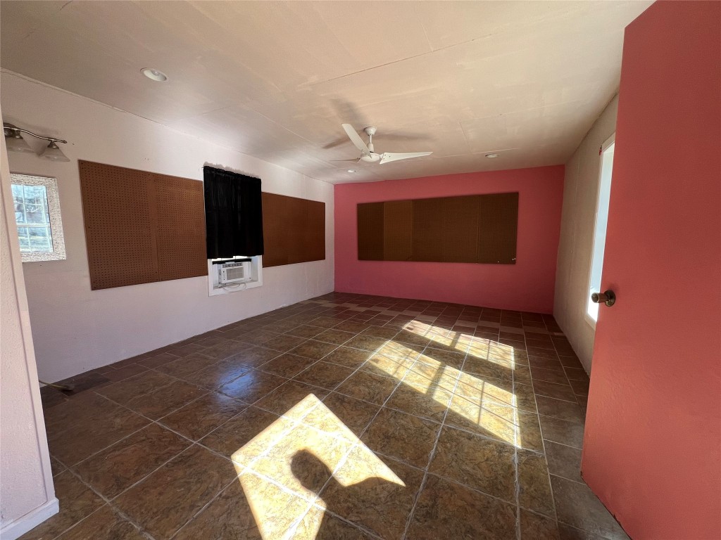 665 Wilson Road Red Rock, TX 78662 - Photo 30 of 34 Unfurnished room with a ceiling fan and cooling unit
