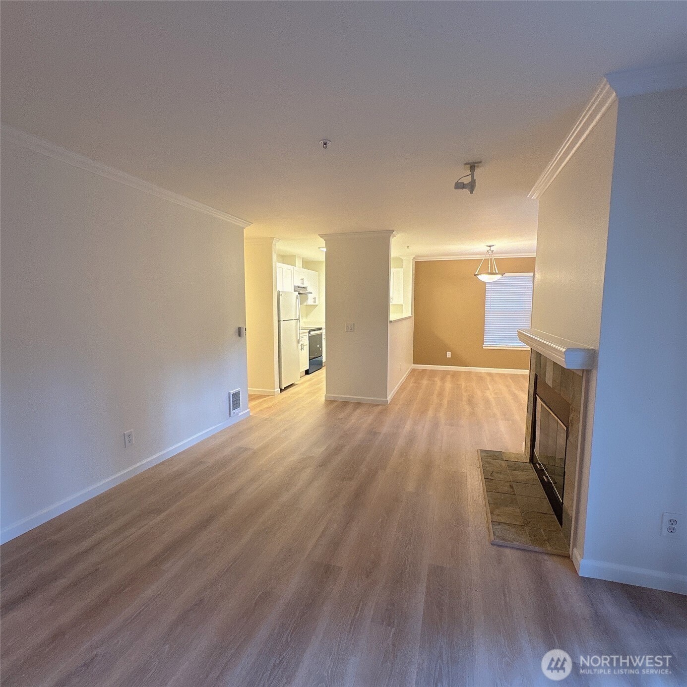 33020 10th Avenue Southwest, Unit A201 Federal Way, WA 98023 - Photo 11 of 15 a view of a room with wooden floor and a bathroom