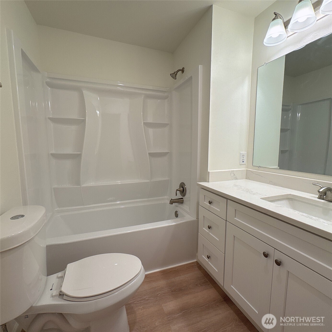 33020 10th Avenue Southwest, Unit A201 Federal Way, WA 98023 - Photo 15 of 15 a bathroom with a toilet a sink and bathtub