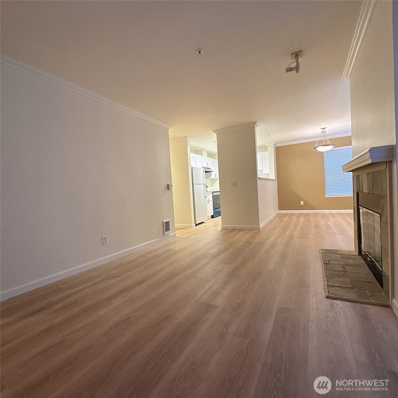 33020 10th Avenue Southwest, Unit A201 Federal Way, WA 98023 - Photo 9 of 15 wooden floor in an empty room with a window