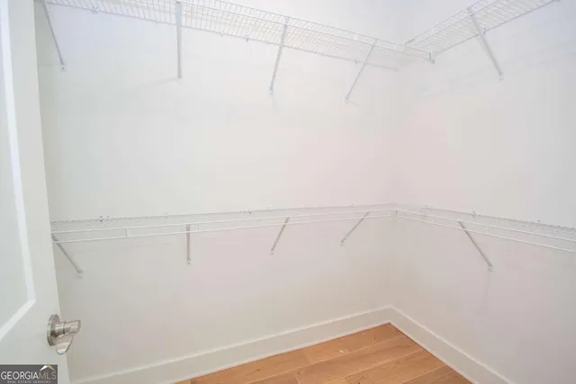 a view of a room with racks on the wall