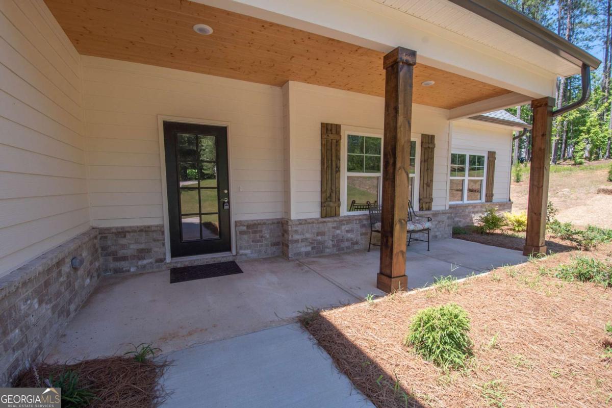 5 Firefly Run LaGrange, GA 30240 - Photo 3 of 53 a view of a house with backyard and porch