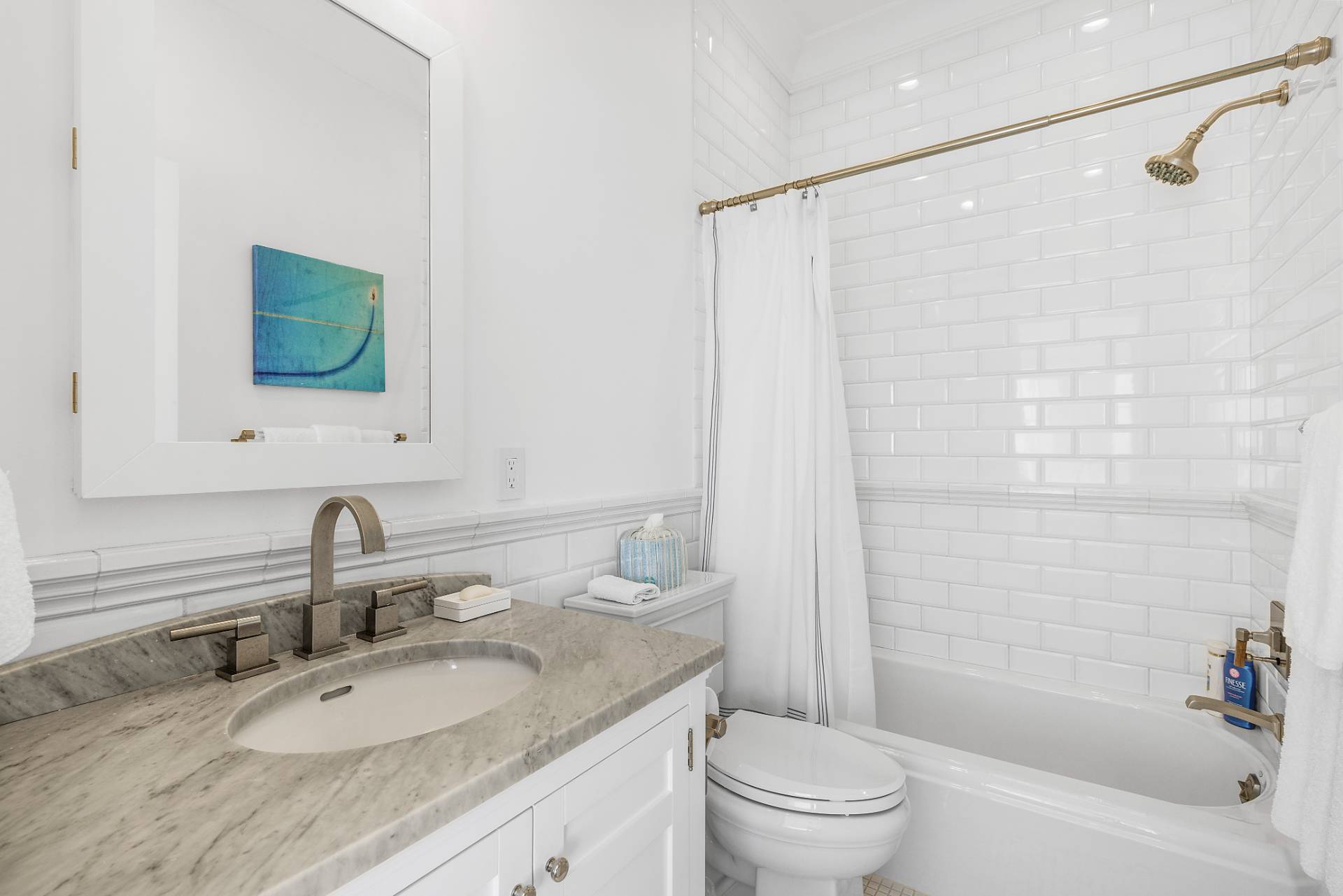 272 Old Montauk Highway Montauk, NY 11954 - Photo 14 of 25 a bathroom with a granite countertop sink a toilet and shower