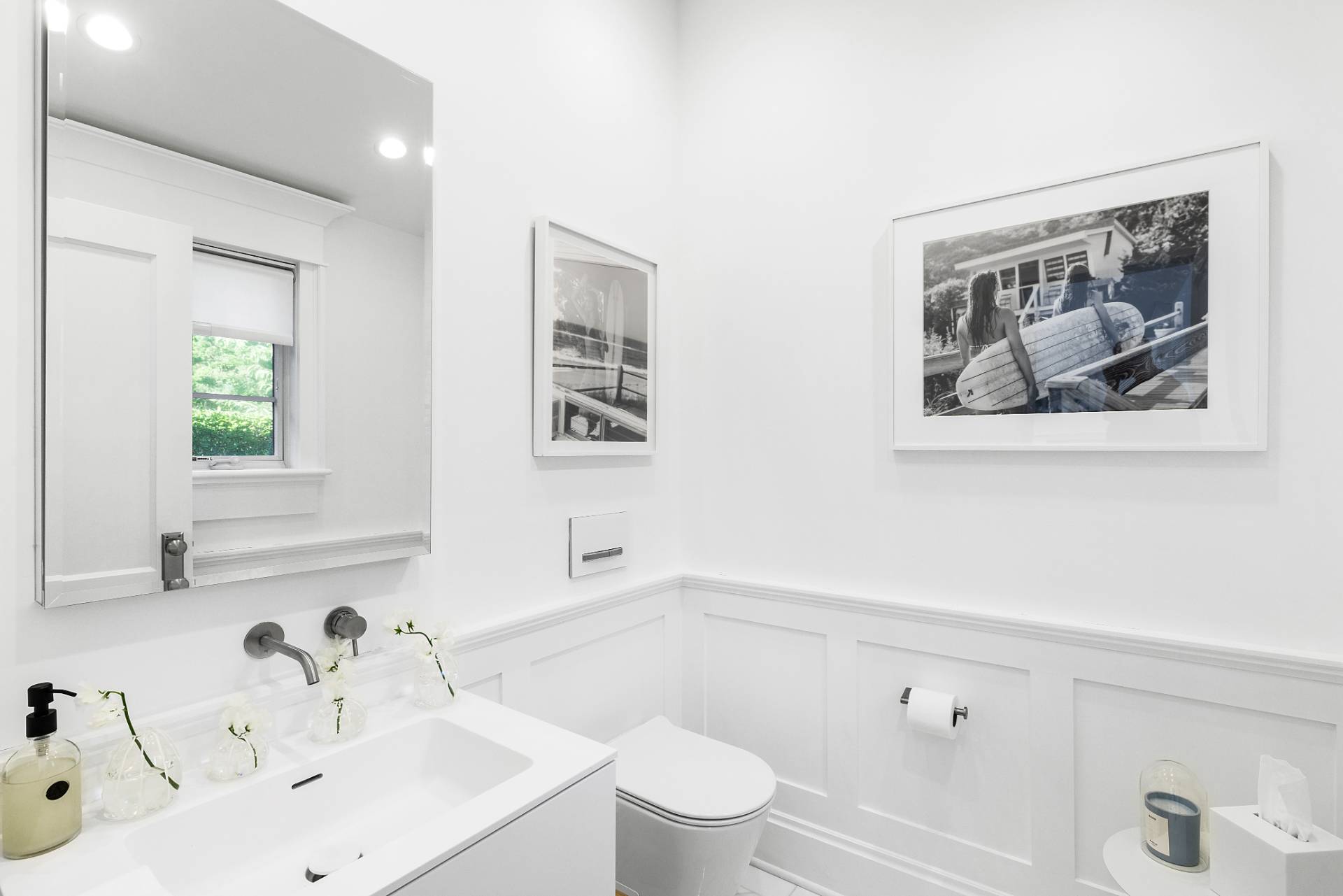 272 Old Montauk Highway Montauk, NY 11954 - Photo 17 of 25 a bathroom with a sink a toilet and a window