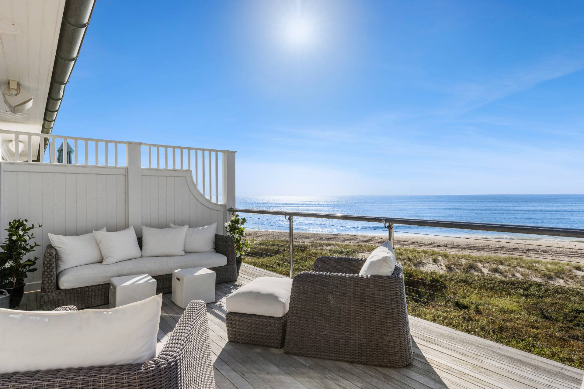 272 Old Montauk Highway Montauk, NY 11954 - Photo 2 of 25 a living room with furniture and a large window