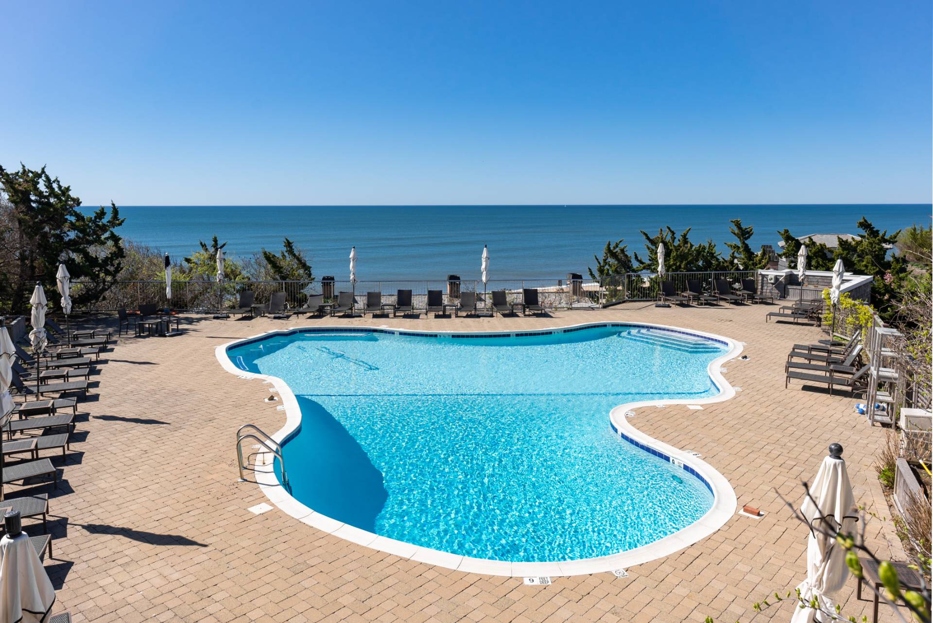 272 Old Montauk Highway Montauk, NY 11954 - Photo 25 of 25 a view of a swimming pool with outdoor seating