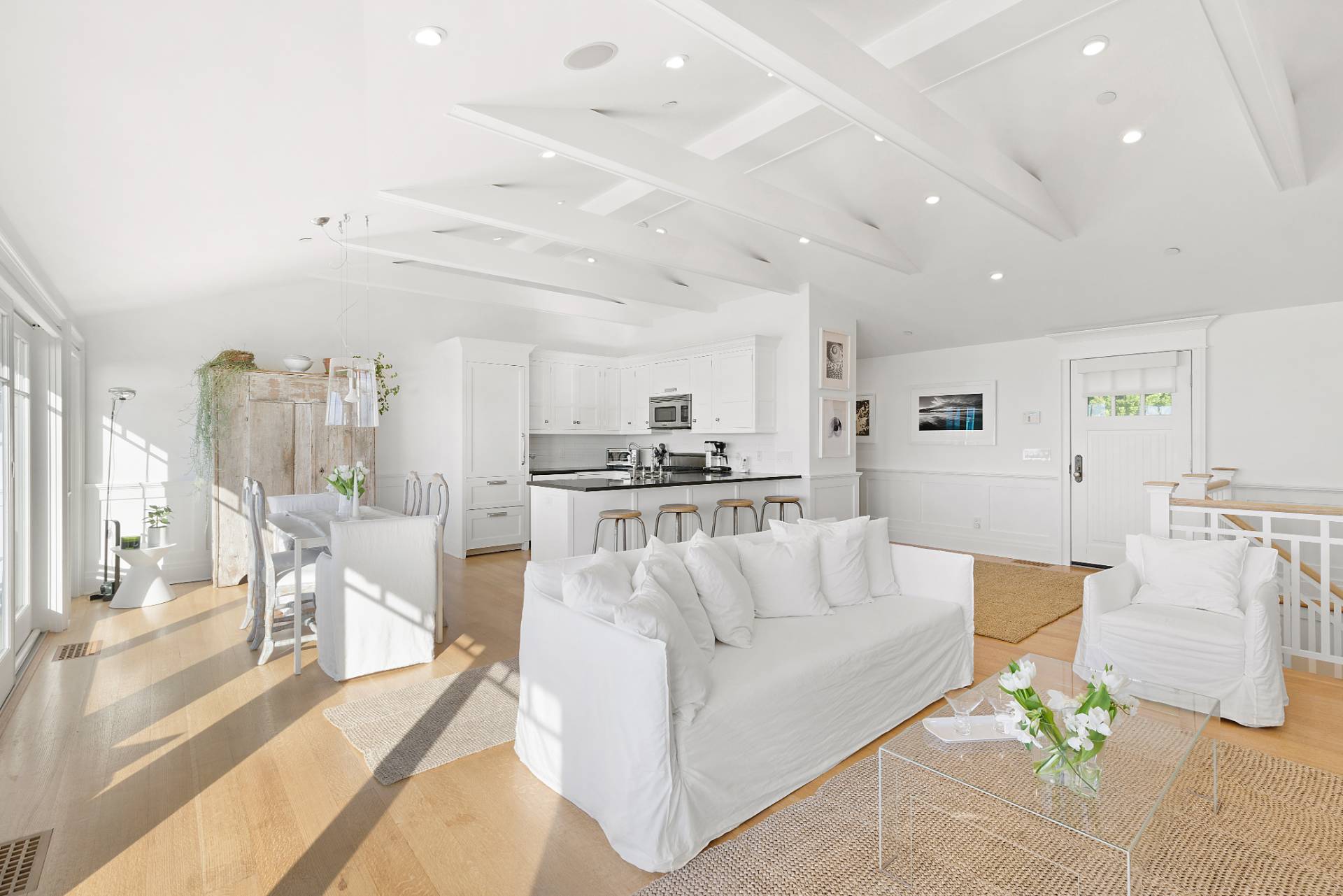 272 Old Montauk Highway Montauk, NY 11954 - Photo 7 of 25 a view of a living room kitchen and a large window