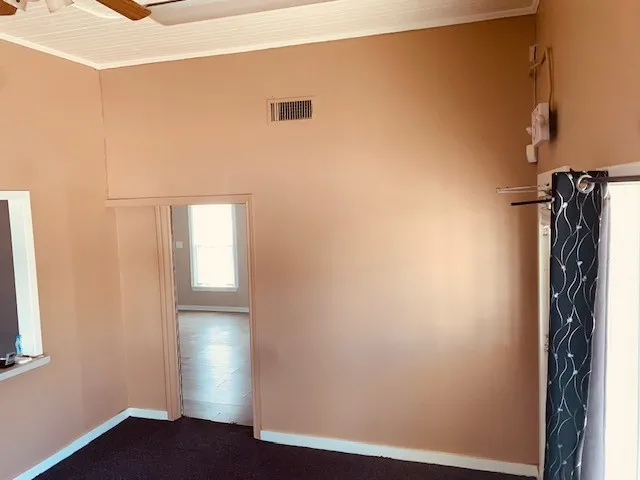 an empty room with windows