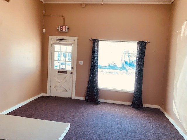401 East Main Street Humble, TX 77338 - Photo 22 of 36 an empty room with windows