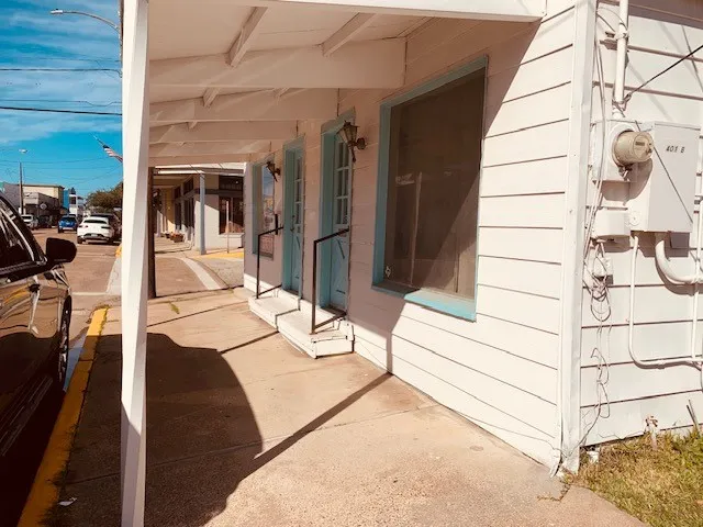 a view of a house with a street