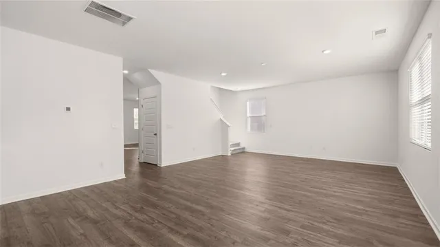 a view of kitchen with wooden floor