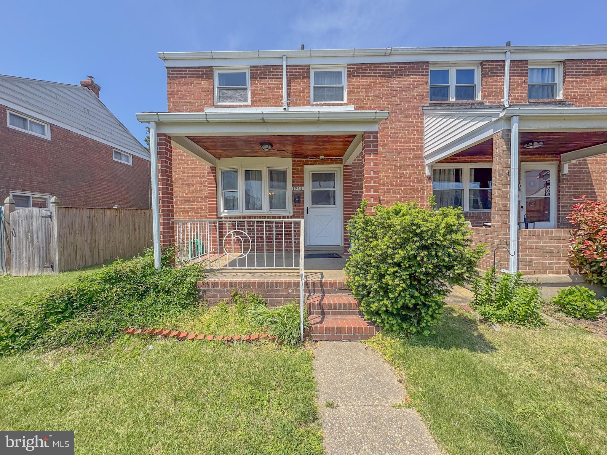 1948 Wareham Road Baltimore, MD 21222 - Photo 1 of 26 front view of a house with a yard