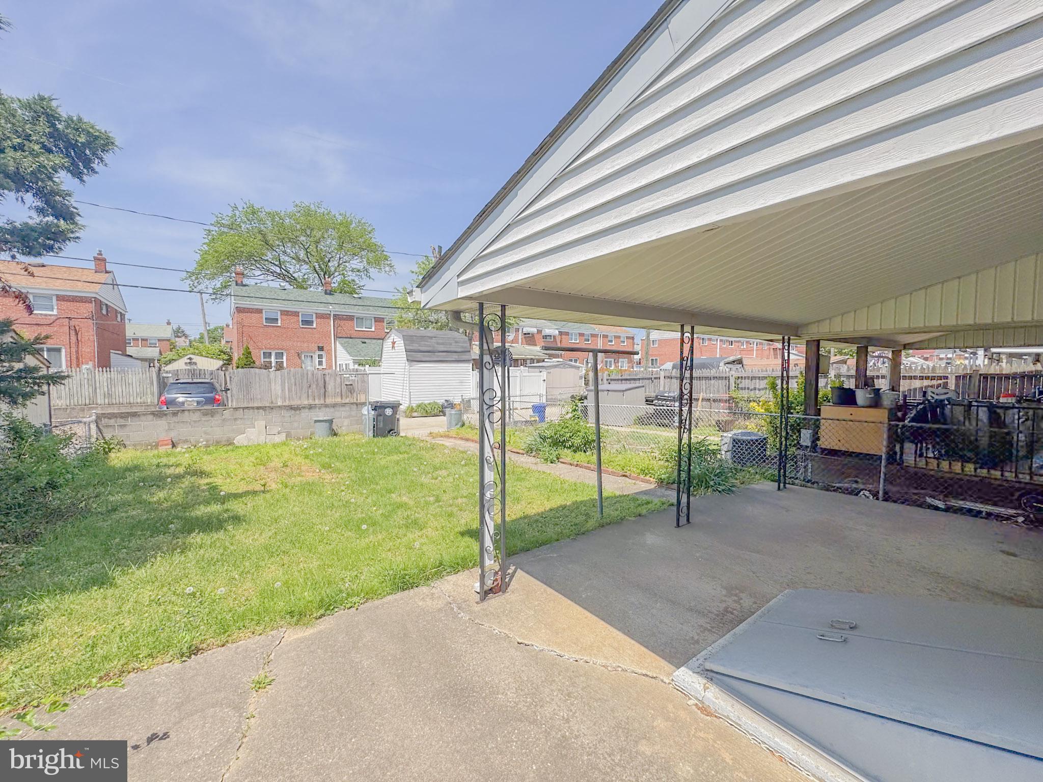 1948 Wareham Road Baltimore, MD 21222 - Photo 25 of 26 a view of a backyard with plants and a patio