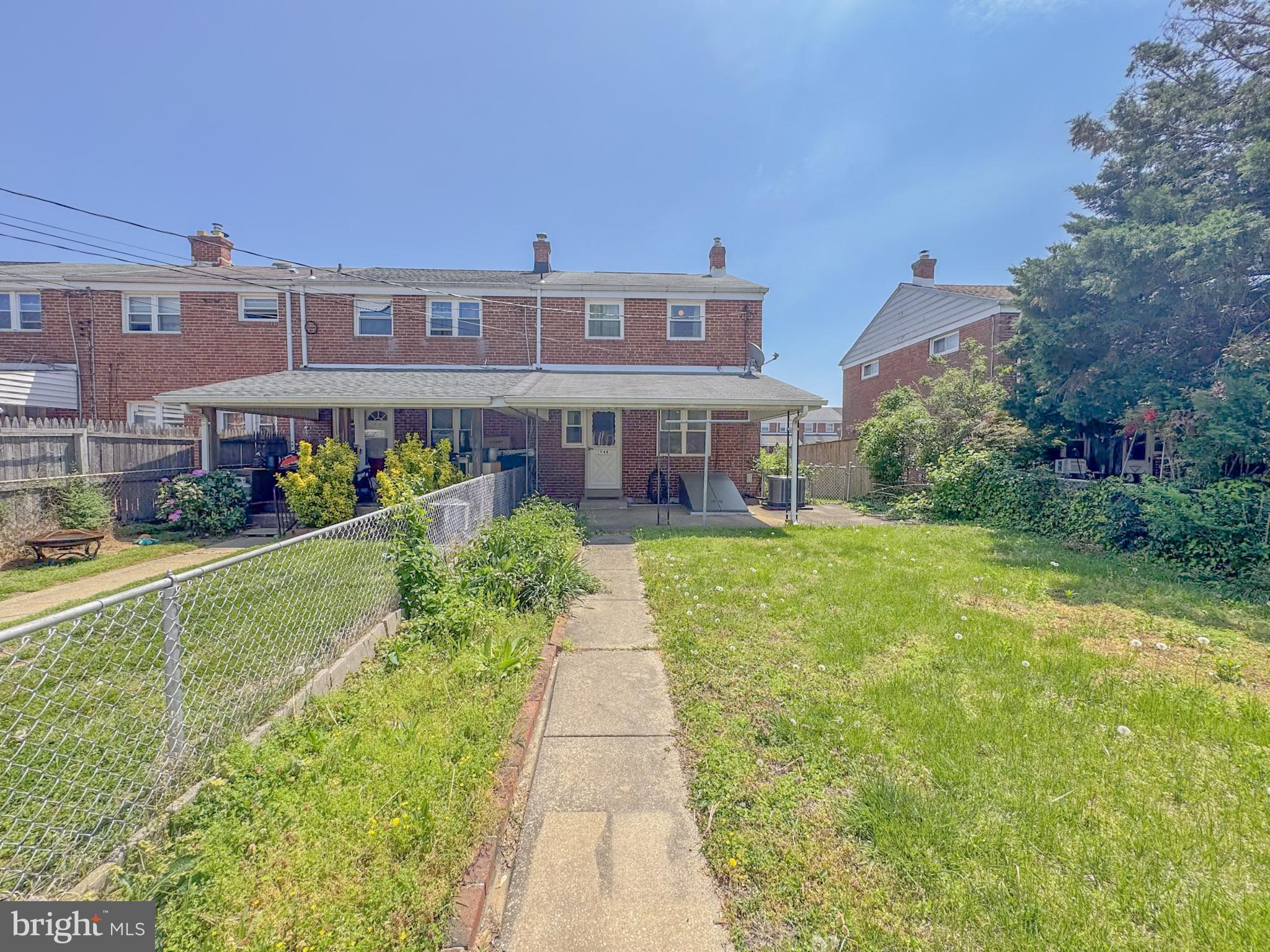 1948 Wareham Road Baltimore, MD 21222 - Photo 26 of 26 a front view of a house with a yard