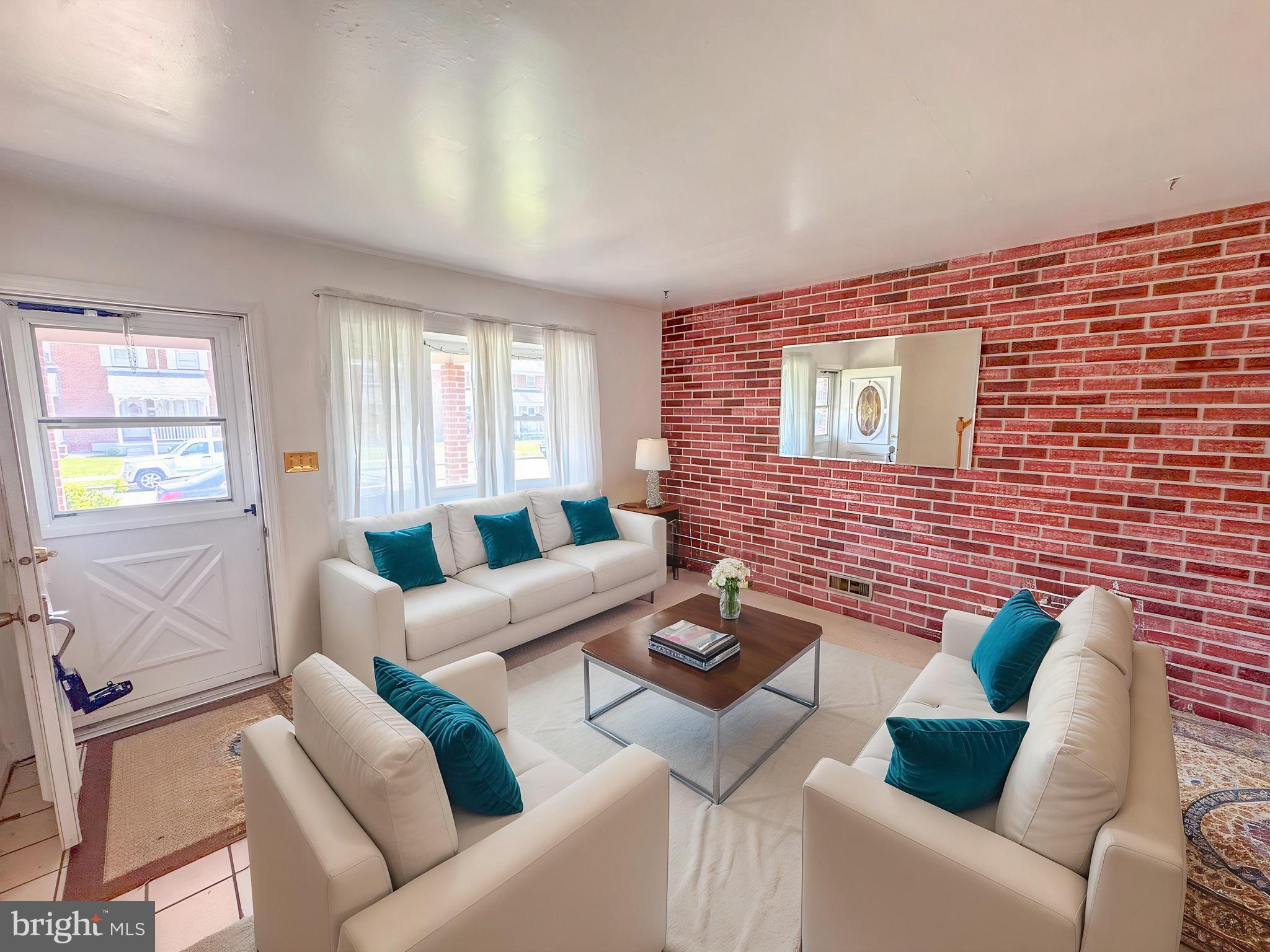 1948 Wareham Road Baltimore, MD 21222 - Photo 4 of 26 a living room with furniture and a window