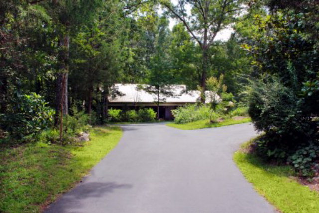85 Woods Road Juliette, GA 31046 - Photo 2 of 36 a view of a backyard with a garden