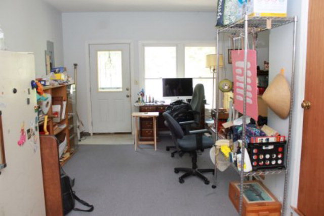 85 Woods Road Juliette, GA 31046 - Photo 21 of 36 a view of a workspace with furniture and a window