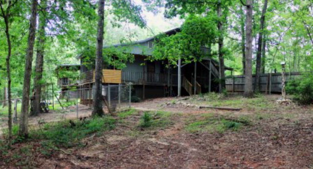 85 Woods Road Juliette, GA 31046 - Photo 28 of 36 a backyard of a house with lots of green space