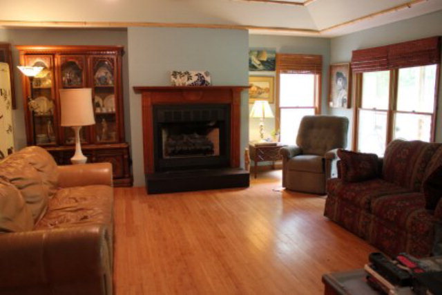 85 Woods Road Juliette, GA 31046 - Photo 5 of 36 a living room with furniture and a fireplace