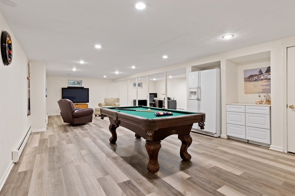 21 Grasshopper Lane Acton, MA 01720 - Photo 28 of 38 a room with furniture pool table and windows