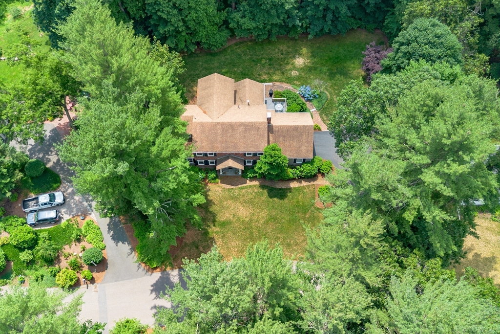 21 Grasshopper Lane Acton, MA 01720 - Photo 35 of 38 an aerial view of a house with a yard and lake view
