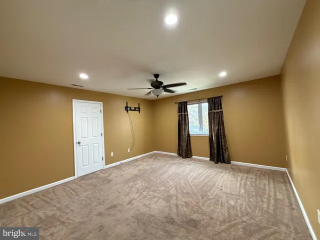a view of an empty room with window