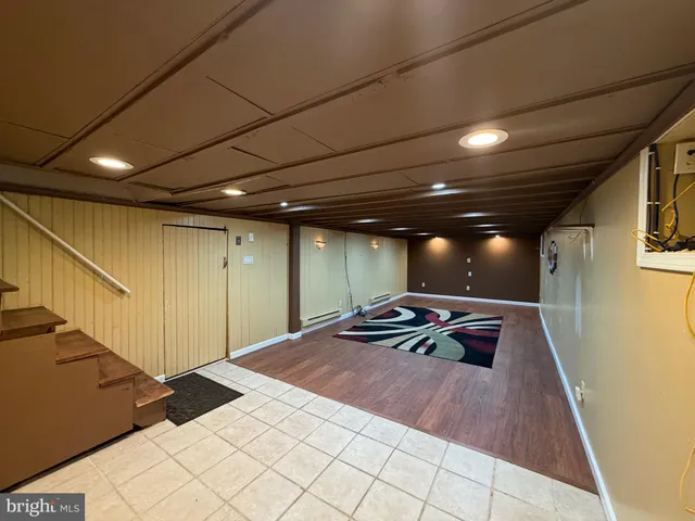 a lobby with furniture and window